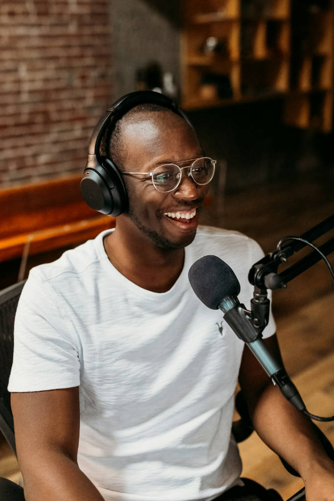 man in white crew neck t-shirt wearing black framed eyeglasses by Kit (formerly ConvertKit)